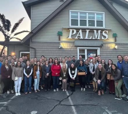 Group of people in front of a supper club.