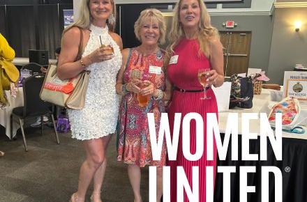 Three women standing 