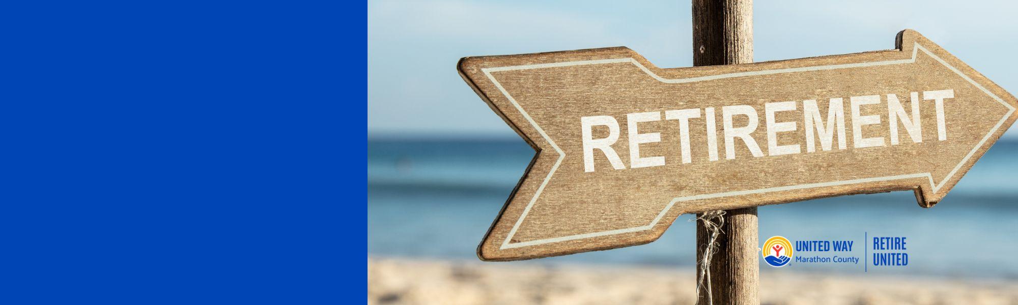 Retirement written on wood on a beach